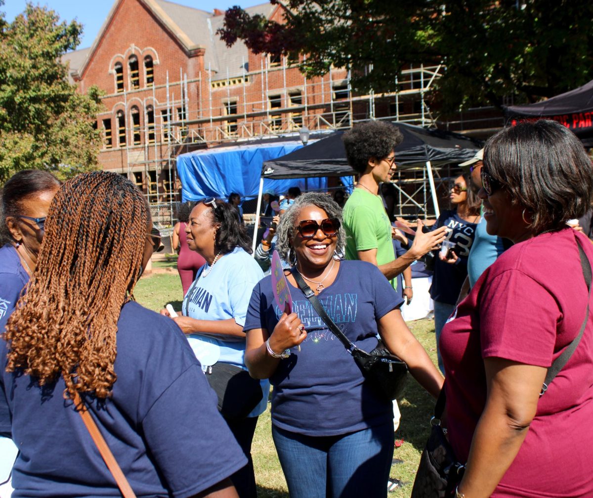 Members of the Spelman Community greet each other